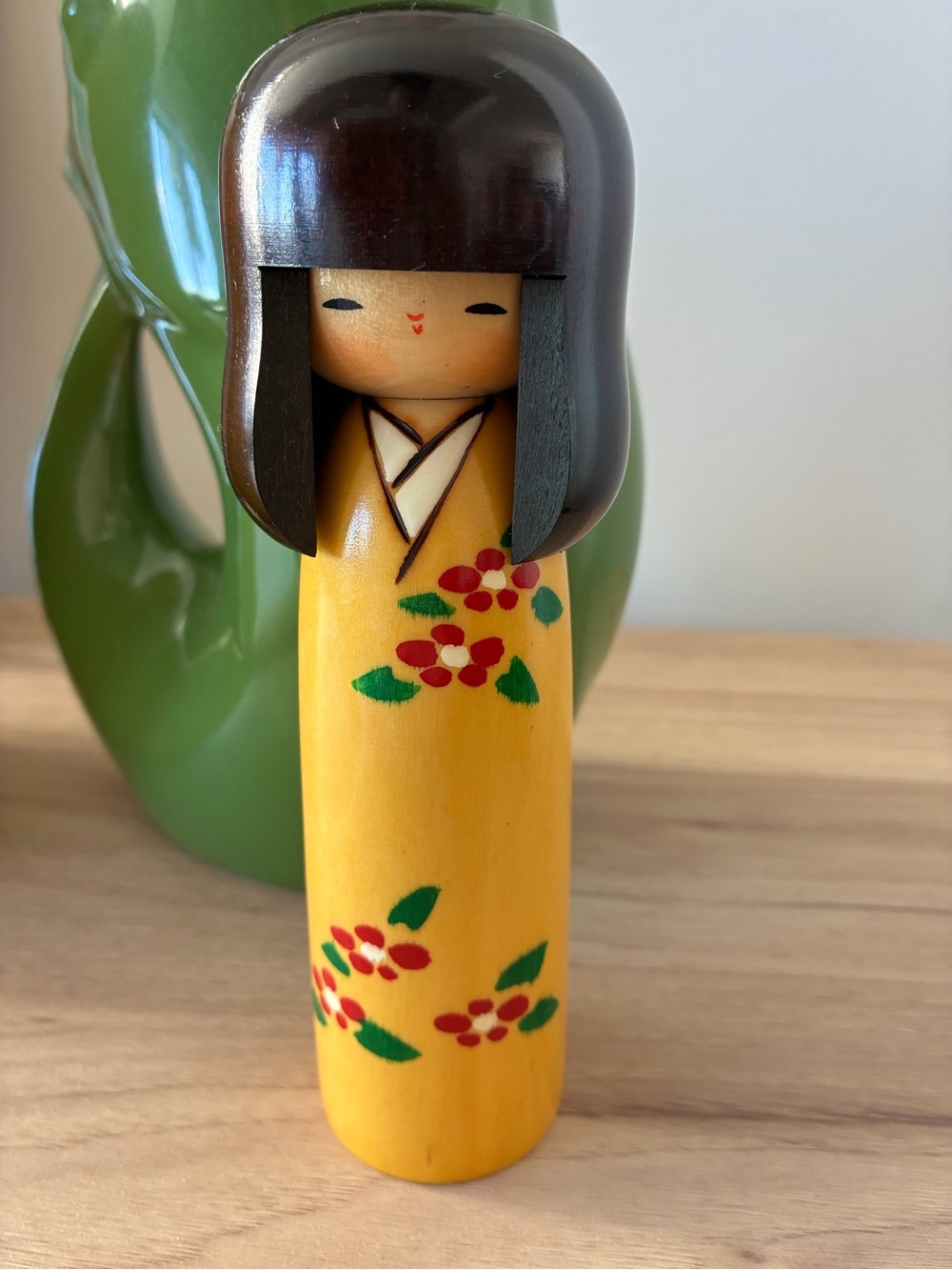 Japanese Kokeshi doll, handcrafted by the famous workshop Usaburo Kokeshi